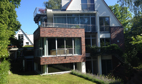 Haus im Haus- 275 m2 zweigeschossige Maisonette Architektenhaus