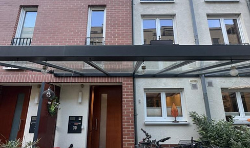 Modern terraced house in the Quartier am Turm. Available at short notice