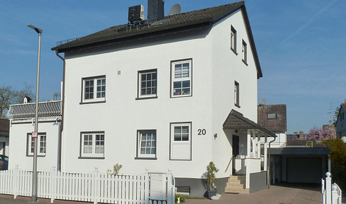 Detached two-family house in a central location in Hattersheim-Okriftel