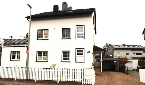 Detached two-family house in a central location in Hattersheim-Okriftel