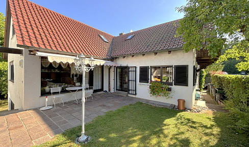 Family-friendly, spacious living in a sought-after location on the outskirts with lots of potential and charm