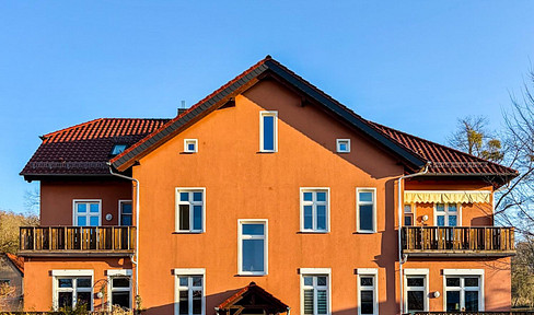 Residential ensemble in the Berlin countryside - apartment building with coach house