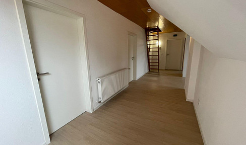 Renovierte Obergeschosswohnung mit Loggia, Garten und Stellplatz im Fachwerkensemble