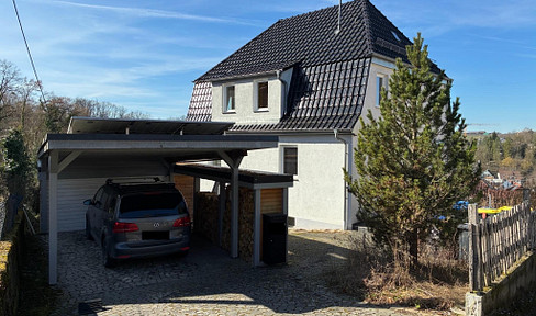 Modernized, detached family home in a scenic location with stunning views and a large garden.