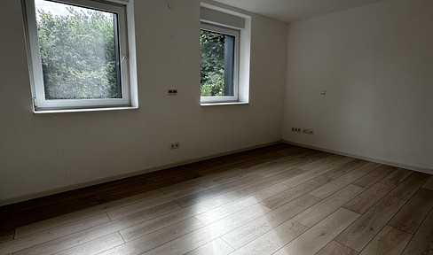 Erdgeschosswohnung mit Terrasse