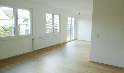 Brand new, 123 square meters, directly on the lake, with a terrace and parking space.