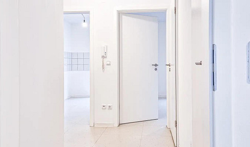 Modernisierte 2‑Zi. EG-Wohnung mit Freisitz & TG-Stellplatz nahe Uniklinik