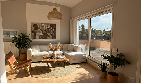 Rooftop apartment with a loft-style design, located near the Hachinger Bach stream.