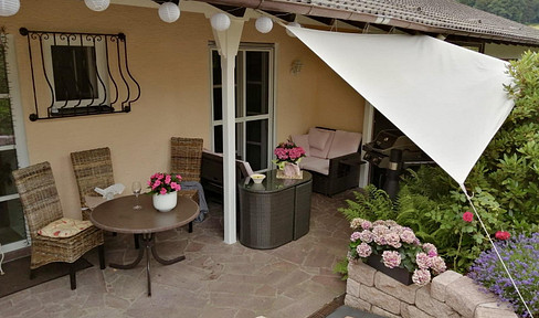 Sunny 5-room apartment with a charging station for electric cars and a large built-in kitchen.