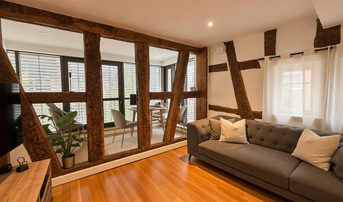 Historic half-timbered house from 1719 – high-quality renovated, with a conservatory and solar energy system.