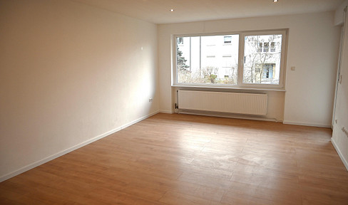 Moderne, lichtdurchflutete 3-Zi-Wohnung mit Südwestbalkon, Garage & Blick ins Grüne in super Lage