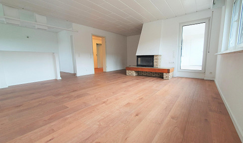 Renovated 3-room apartment with fitted kitchen, balcony and underground parking space