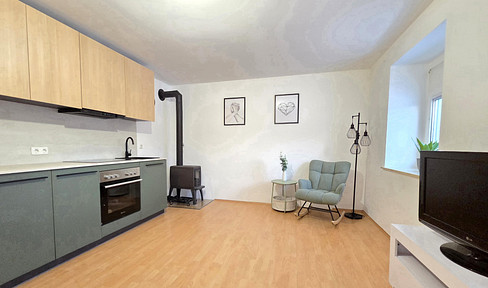 SELTEN: Small apartment with new kitchen & direct garden access