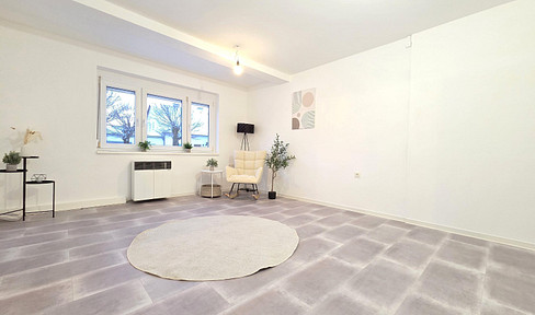 Attractive condominium with new kitchen & direct garden access!