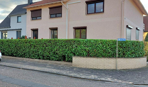 3 room apartment on 2 floors with front garden and cellar.