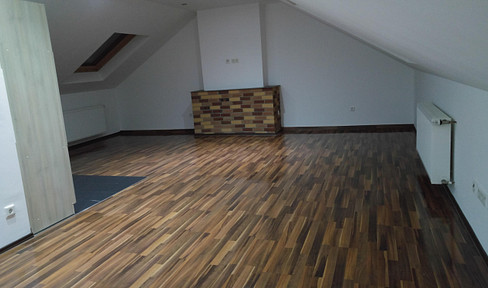 Dachgeschosswohnung Stadtmitte