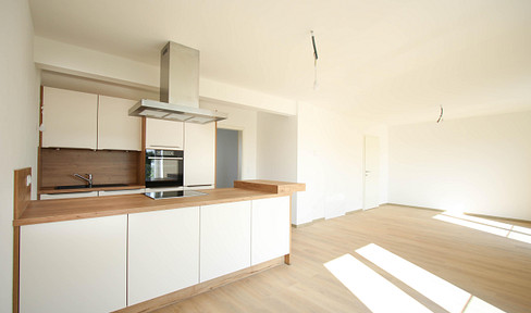 Private bright apartment with top location and 107m² attic - first occupancy