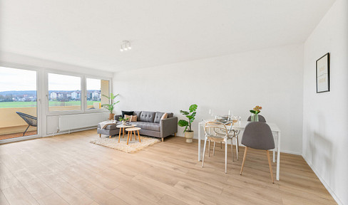 Ready-to-occupy 3-room apartment with balcony, elevator & parking space - quiet view of the countryside