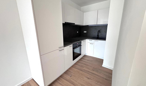 Light-flooded 2-room apartment with fitted kitchen and balcony! NEW BUILD