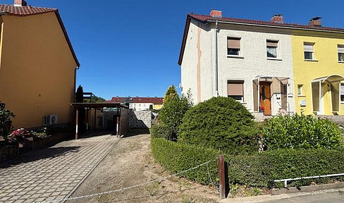 End terraced house with basement and garden