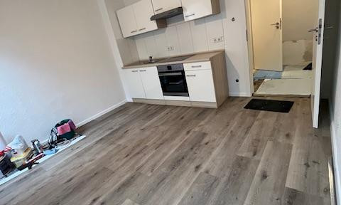 Cozy 2-room attic apartment incl. kitchen, top location