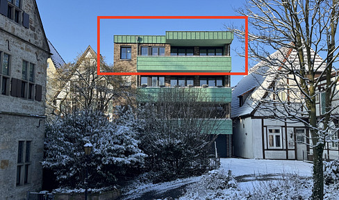 Top-floor apartment in mint condition with large balcony in city center location