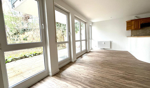 First occupancy after renovation 2.5-room apartment, with terrace, garden, fitted kitchen and underground parking space