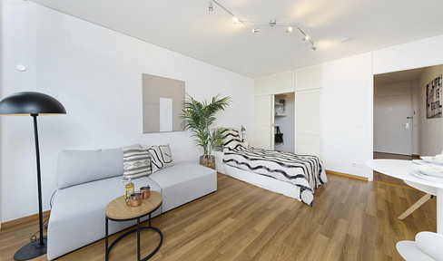 Furnished, renovated 1.5-room apartment with far-reaching views over Munich