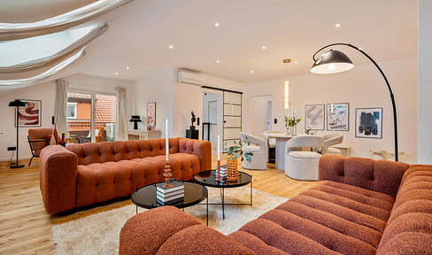 Freshly renovated luxury in a top location with roof terrace, air conditioning and underground parking space - commission-free
