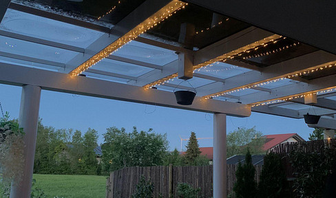 Großzügige 4,5-Zimmer-Gartenwohnung mit überdachter Terrasse & traumhaftem Ausblick