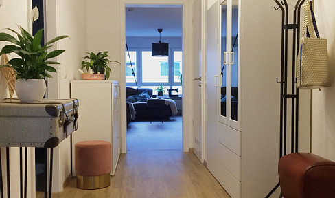 Stylisches Wohnen: helle 3,5-Zimmer Wohnung mit TG-Stellplatz und Balkon