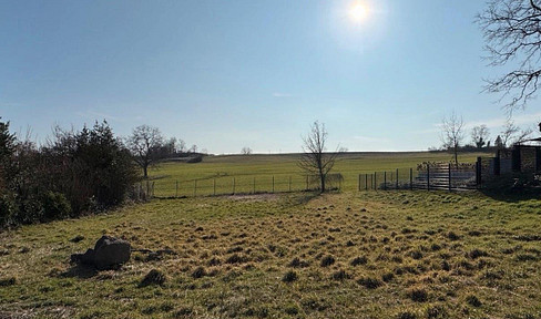 Dream plot free of commission in a prime location with southern exposure on the edge of a field