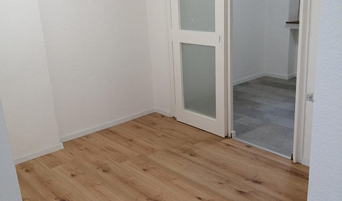 Renovated first floor apartment with fitted kitchen