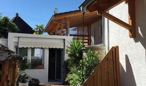 House with a yard.
Alternatively:
House and garden.
Or:
Property with a house.
The best option depends on the specific context.