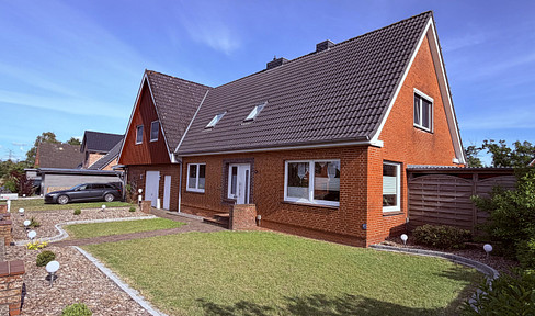 Charming single-family home with a south-facing garden and plenty of living space.