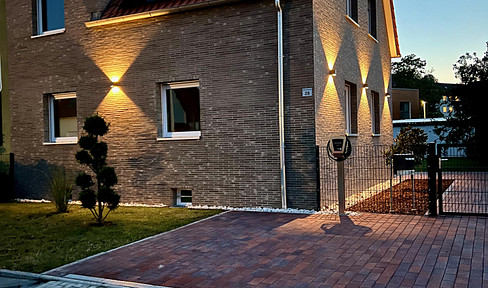 Exclusive smart-energy family home featuring a 25 kW photovoltaic system, a wallbox charging station, and a large garden.