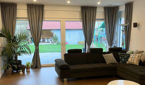 Modern family home with a large garden and smart home features, located in a quiet area of Bielefeld-Sennestadt.