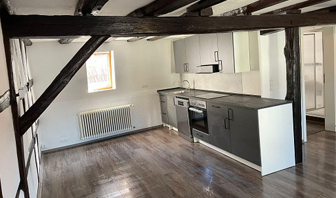 Renovated half-timbered apartment in the town center.