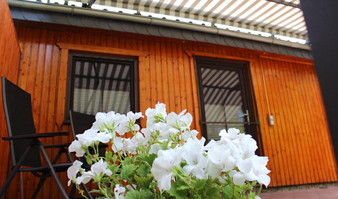 High-quality Chalet-style house in a peaceful, green setting.