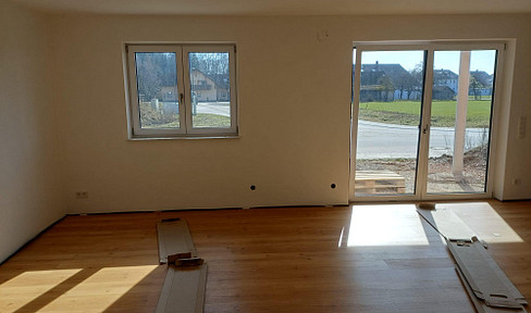 Modern, newly built 3-room apartment with a large garden.