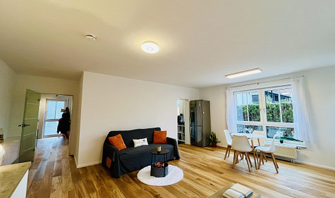 105 m² of living/usable space – garden apartment with sauna, 40 m² hobby room, and garage.