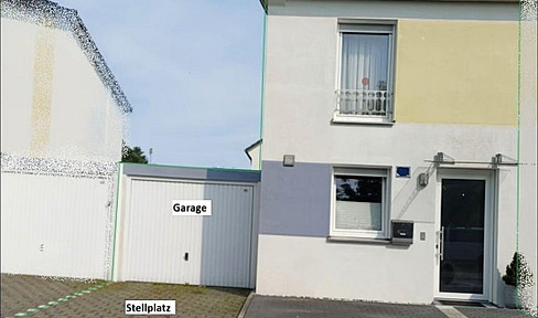 Modern terraced house with corner plot.