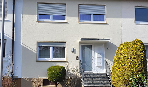Investment property in Bielefeld – Fully let, mid-terrace house with three apartments.