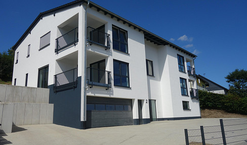 2-Zimmer-Neubau-Wohnung mit Einbauküche, Tiefgaragenplatz und Loggia!