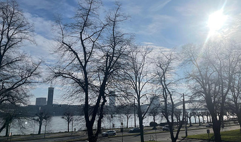 Furnished apartment with a direct, impressive view of the Rhine, located in a stylish building in the best part of Cologne's old town.