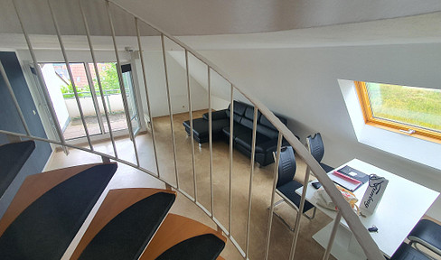 Bright 2.5-room maisonette apartment with a great view in Kirchberg.