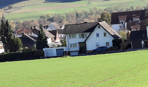 Large house suitable for families or as an investment property, located on the edge of a field.