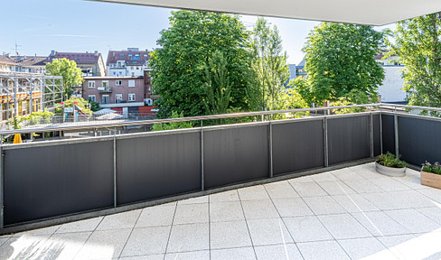 Modern 3.5-room apartment in Stuttgart-West with a balcony, fitted kitchen, elevator, underground parking, and a charging station for electric vehicles.