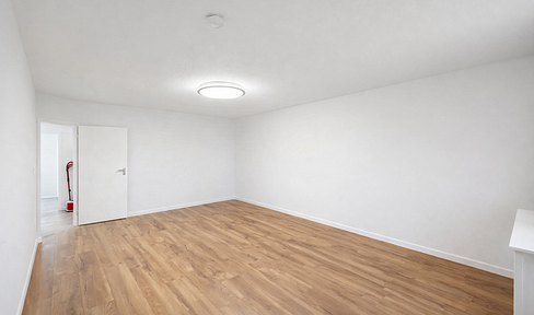 Large, renovated 2-room apartment with a spacious balcony.