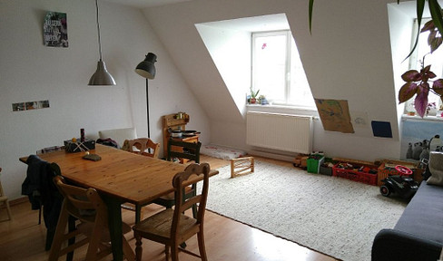 **Bright and spacious:** 4-room apartment with fitted kitchen.